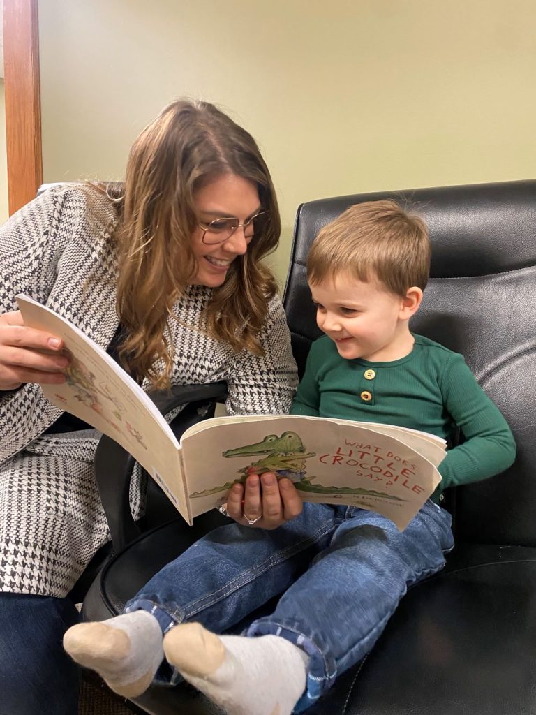 Mom reads to son